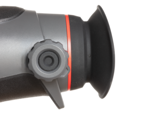 Close-up of the focus knob on a night vision monocular