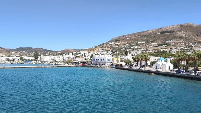Video footage of arriving on the island of Paros by ferry from Antiparos, Greece, gliding across the Aegean Sea toward the charming harbor of Paros island.