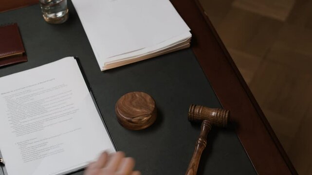 Hands of Justice: A Lawyer at Work and gavel strike