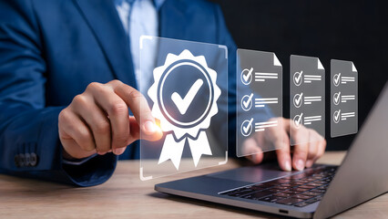 Business professional interacting with a quality assurance checkmark icon on a laptop, symbolizing accreditation and compliance with standards for successful project management.