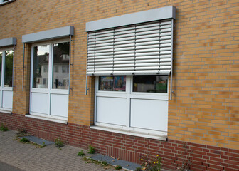 Exterior window shutters in Europe used for protection against sunlight and burglary. Security and...