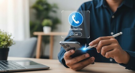 Connecting with ease: A man uses his smartphone to call through a holographic button, combining high-tech visuals with a personal touch