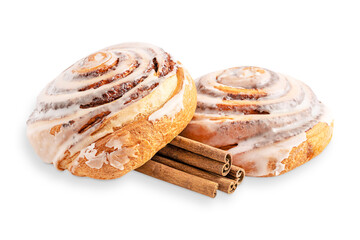 Close up view of two delicious sweet homemade cinnamon rolls bun or swirl dessert glazed with sugar...