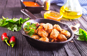 Meat meatballs with spices, sauce and garlic. Top view, copy space.