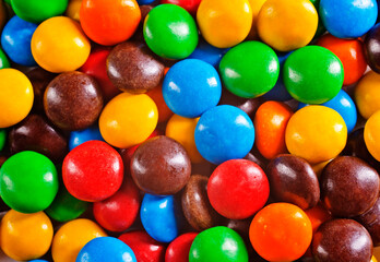 Multi-colored sweet candies (confectionery) of different colors.
