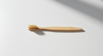 Flat lay of gold spoon on white and gray background for minimalist kitchen or tableware design