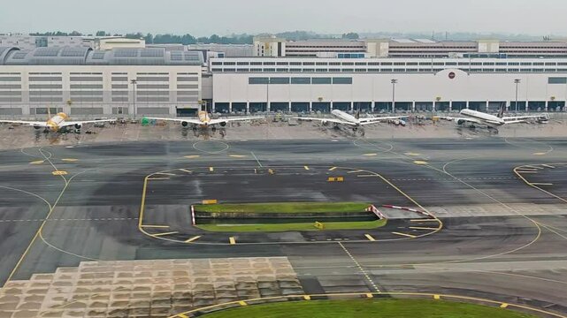 Singapore. Airplane landing at Singapore Changi Airport. 4K video footage of plane landing