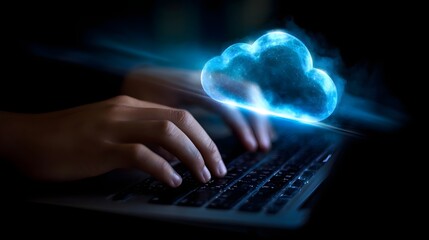 A close up view of hands typing on a laptop keyboard with a glowing blue holographic cloud icon floating above the screen representing the digital transformation and cloud computing