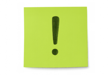 Green sticky note displaying prominent dark exclamation mark, signaling urgent communication against transparent backdrop