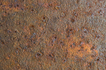 赤錆の背景用テクスチャー。経年劣化で錆びたガードレールの支柱