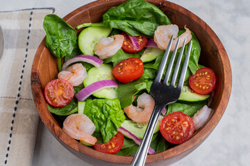 spinach salad top with  shimp