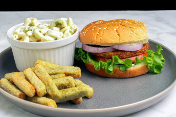 garden burger  with veggie fries and macaroni salad