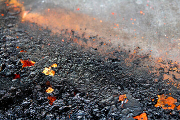 Close up of heavy black rust on a brass base of a kitchen sauce pan abstract background