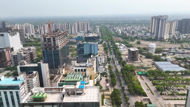 Aerial drone shot highlighting the organized grid layout of Noida&rsquo;s city planning.