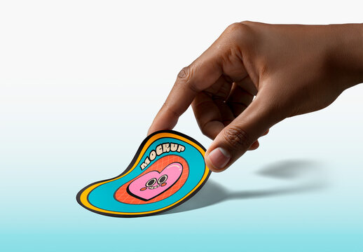 Hand Holding Round Sticker Mockup