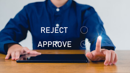 Approved, accept, pass inspection, Businessman writing or tick correct mark to approve document and project concept.