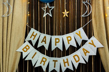 Elegant Silver and Gold Glitter Happy Birthday" Banner with Festive Decorations"
