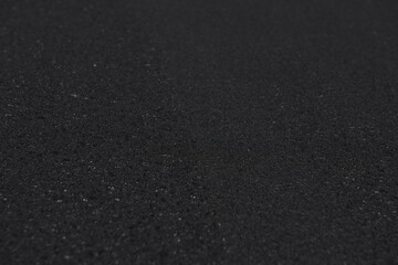 Obraz premium Freshly laid black asphalt on the street.