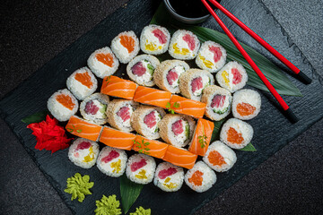 Savory sushi rolls with fresh fish and vibrant vegetables, artfully arranged