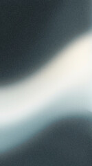 Abstract blurred background featuring soft gradients of gray and white, creating a serene and...