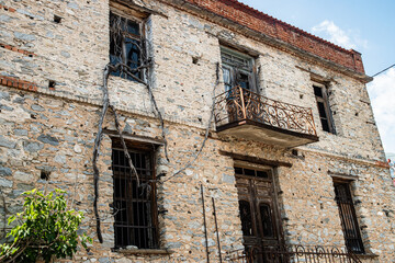 Old, abandoned Mediterranean house, showcasing weathered beauty and forgotten history