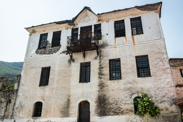 Old, abandoned Mediterranean house, showcasing weathered beauty and forgotten history