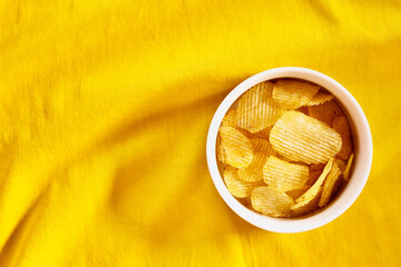 White bowl with potato chips