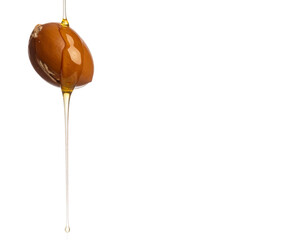Golden argan oil flows
