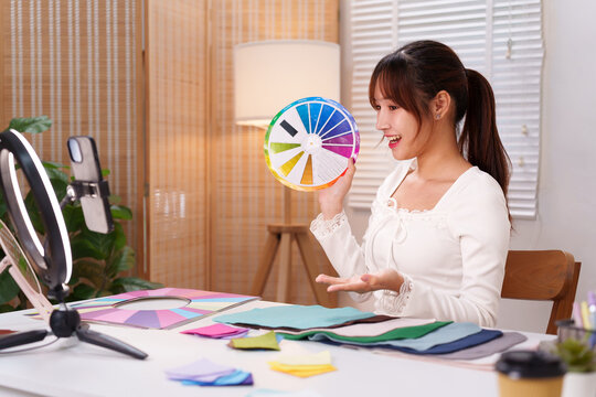 Personal Color Analysis Coaching Online Asian Woman with Color Wheel for Style Consultation and Seasonal Fashion Tips for Wardrobe Selection