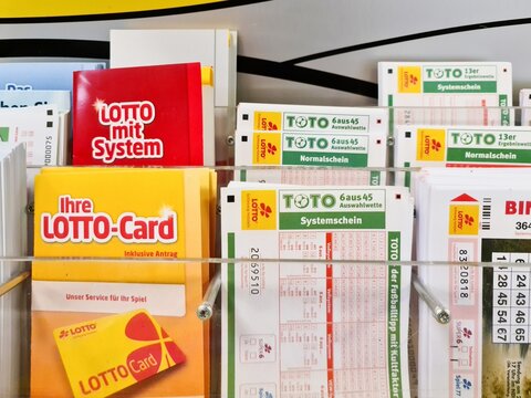 Kiel, Germany - 18. June 2025: Lotto cards and toto betting slips showing gambling and lottery in Germany