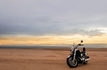 Adventure motorcycle in the Namib Desert – premium stock photo capturing off-road freedom,...
