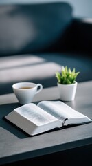 Contemporary Coffee Table Displaying Open Bible and Herbal Tea with Potted Succulent in Cozy Living Room