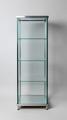 Tall Glass Trophy Case Displaying Sleek Metal Frame with Empty Shelves