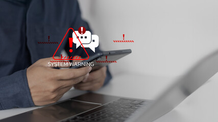 Person holding a tablet with red alert icons and a system warning message, representing cybersecurity risks, malware alerts, and critical communication threats.