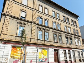 Old urban brick building facade.