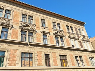 Old urban brick building facade.