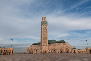 Fototapeta premium Hassan II Mosque Against Blue Sky – Famous Moroccan Mosque in Casablanca with Beautiful Islamic Geometric Design