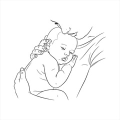 Mother kissing sleeping baby infant