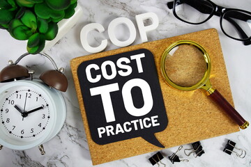 COP Code Of Practice acronym with alarm clock and magnifying glass, Business concept background