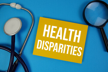 Health Disparities text with Stethoscope and magnifying glass on blue background