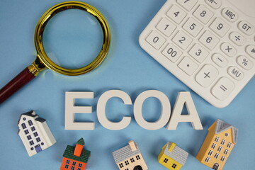 ECOA abbreviation of Equal Credit Opportunity Act alphabet letters with house model, magnifying...
