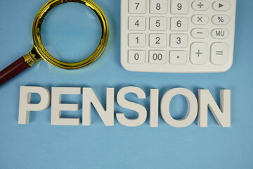 PENSION alphabet letters with magnifying glass and calculator on blue background