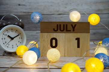 Wooden Calendar Showing the Date of July 1st. Day 1 of July month