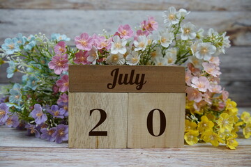 Wooden Calendar Showing the Date of July 20th. Day 20 of July month