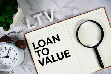 LTV - Loan To Value acronym on notepad, Business concept background