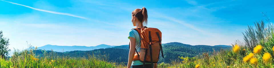 Hiking adventure in scenic mountains outdoor exploration nature viewpoint tranquil environment for fitness enthusiasts