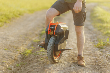 Off-Road Adventure Riding Electric Unicycle on Dirt Trail