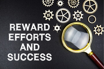 Reward Efforts and Success text message with magnifying glass on black background