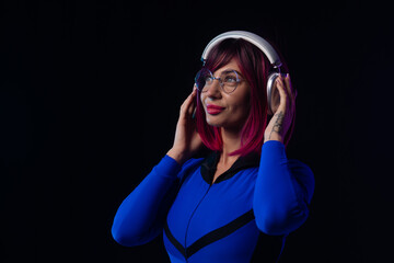 Futuristic woman in blue bodysuit with headphones