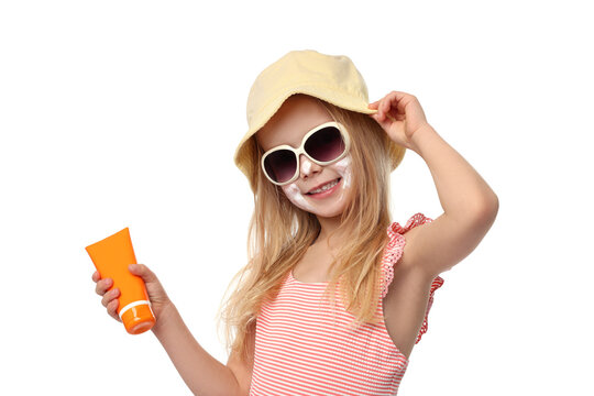 Smiling little girl with tube of sun protection product on white background - Powered by Adobe